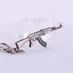 Ключодържател с висулка във форма на оръжие