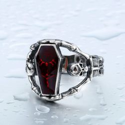 Nenavaden prstan z rdečim kamnom v obliki krste