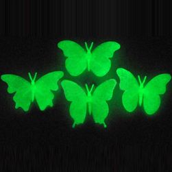 Fluorescenčni metulji na steni