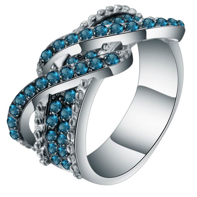 Prsten vykládaný modrými kamínky 1
