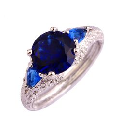 Dámský prsten s modrým kamínkem - stříbrná barva
