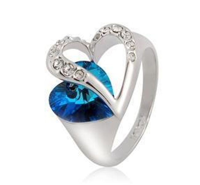 Pierścionek  w kształcie serca z niebieskim kamyczkiem 1