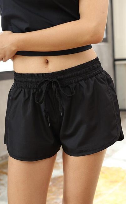 Ženske hitrosušeče tekaške hlače v črni barvi 1