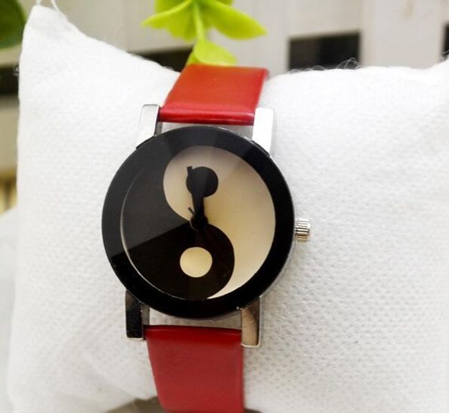 Óra egy yin és yang szimbólummal 1