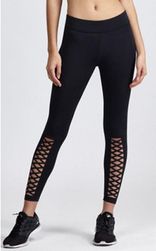 Damskie legginsy do fitnessu z otworami z przodu