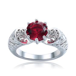 Ženski prsten upečatljiv - crveni kamen