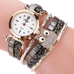Zegarek z długim paskiem i sową